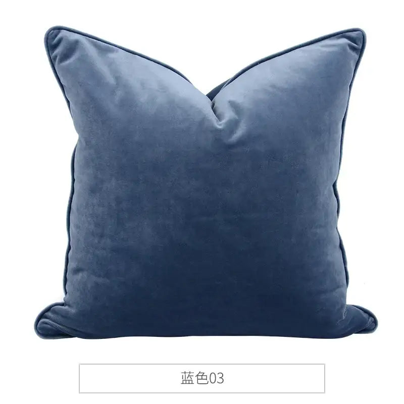 A plush navy blue velvet throw pillow with soft texture and stitched edges decorbites luxe italy velvet pillowslip