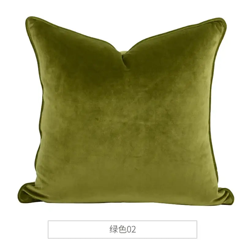 Olive green velvet throw pillow with plush texture and stitched edges in decorbites luxe italy velvet pillowslip