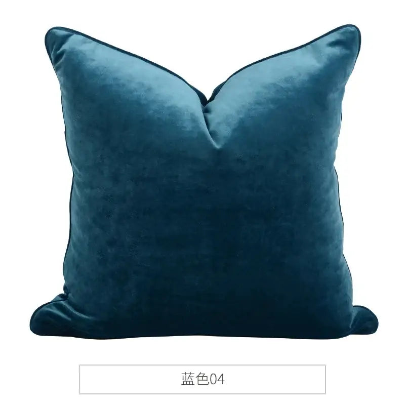 A plush deep teal decorbites luxe italy velvet pillowslip with soft texture and neatly stitched edges for sofa use