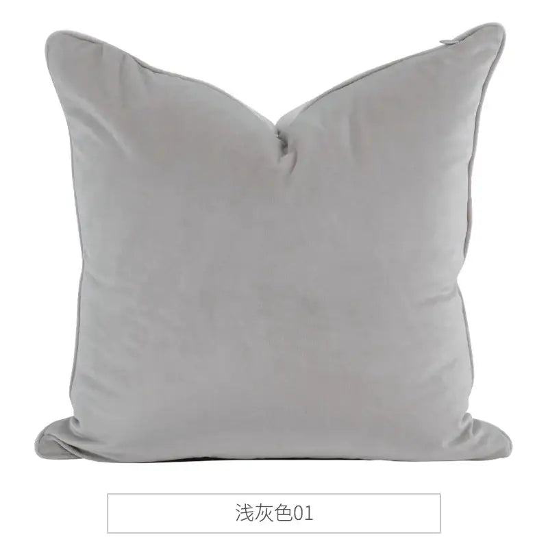 A soft light gray velvet square pillow with subtle edge stitching in the decorbites luxe italy velvet pillowslip case
