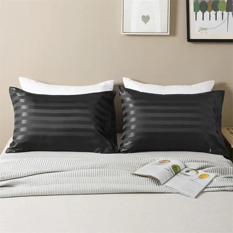 Black satin pillow cover set with subtle jacquard stripes for a sleek and luxurious queen and king size cover set