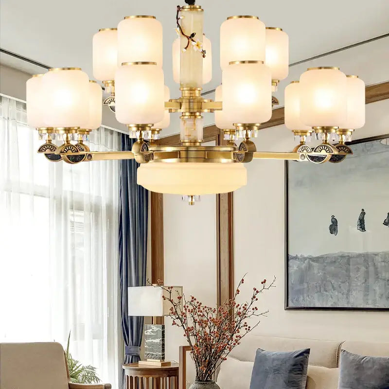 Brass-finished decorbites luxe jade chandelier with frosted glass shades and decorative branch accents for living spaces
