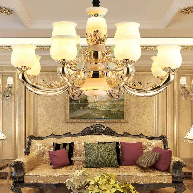 Gold-toned decorbites luxe jade copper living room chandelier with ornate curved arms and frosted glass shades