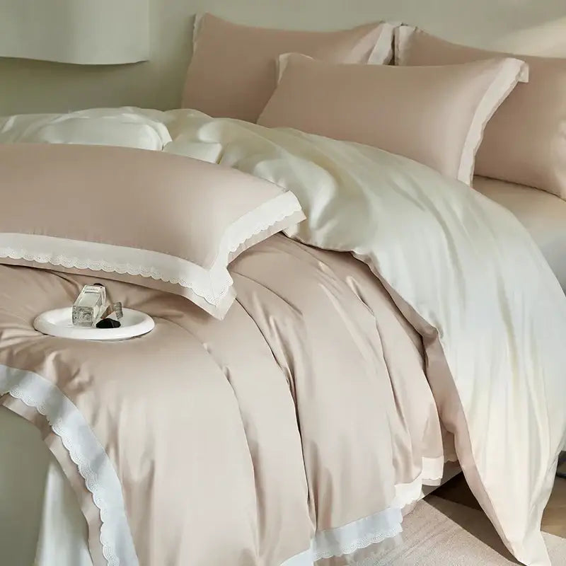 A soft blush pink satin duvet set with delicate white lace trim from decorbites luxe lace bedding set 1000tc egyptian cotton