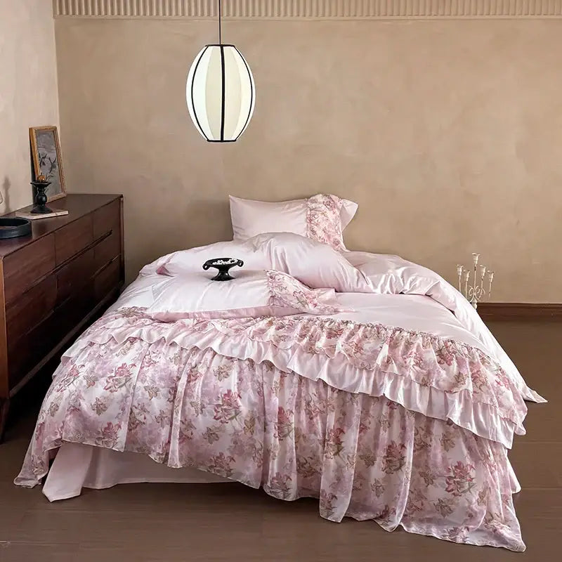 Pink floral ruffled bedding set with layered satin fabric and delicate rose patterns by decorbites luxe lace ruffles