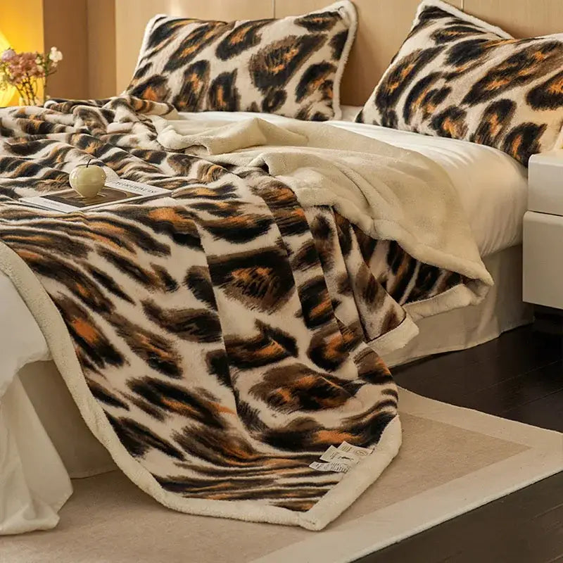 Decorbites luxe leopard throw blanket with faux fur leopard print and cream plush lining for cozy office and sofa use