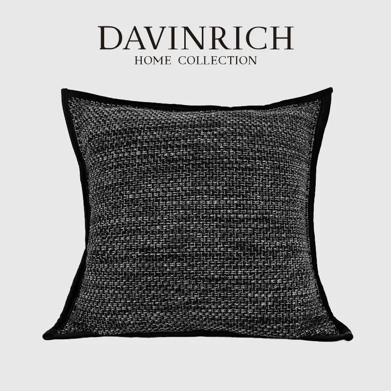 Black textured throw pillow with woven fabric and contrasting trim from decorbites luxe linen blend cushion covers set