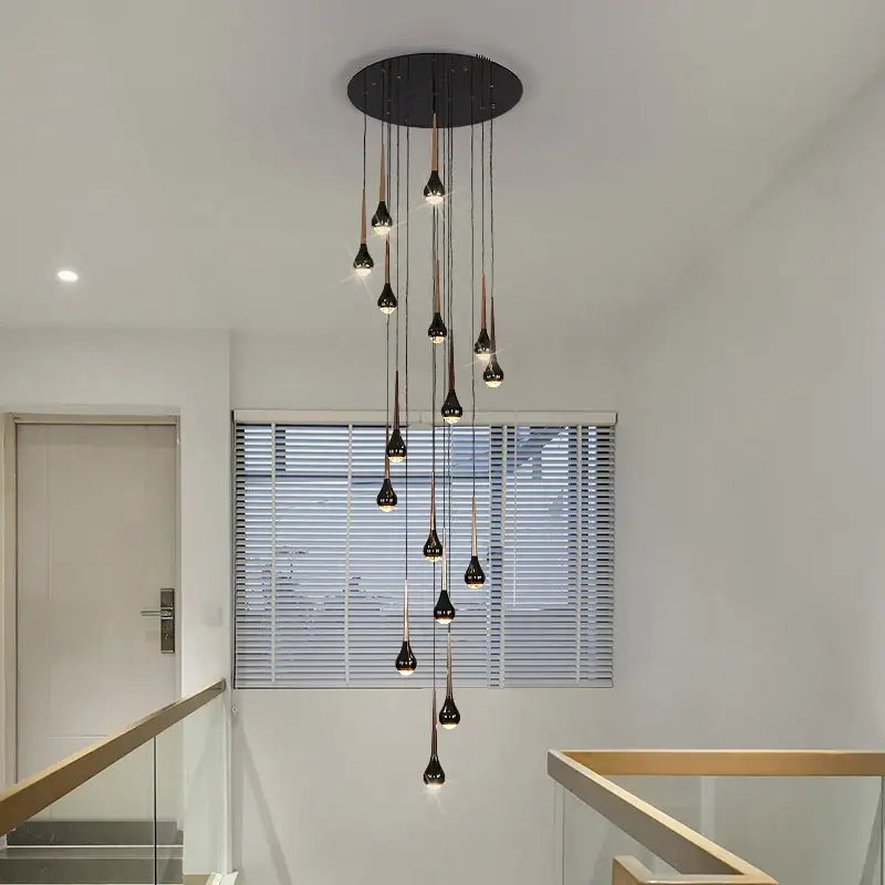 Black modern decorbites luxe loft chandelier with multiple teardrop lights and circular ceiling mount for living spaces