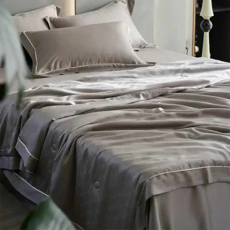 Gray satin duvet cover with subtle dot pattern and matching pillowcases for decorbites luxe lyocell summer blanket mulberry silk fill