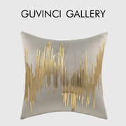 A square gray velvet cushion cover with luxe metallic stripes in gold by decorbites featuring an abstract wave design