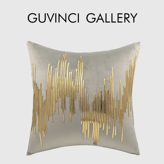A square gray velvet cushion cover with luxe metallic stripes in gold by decorbites featuring an abstract wave design
