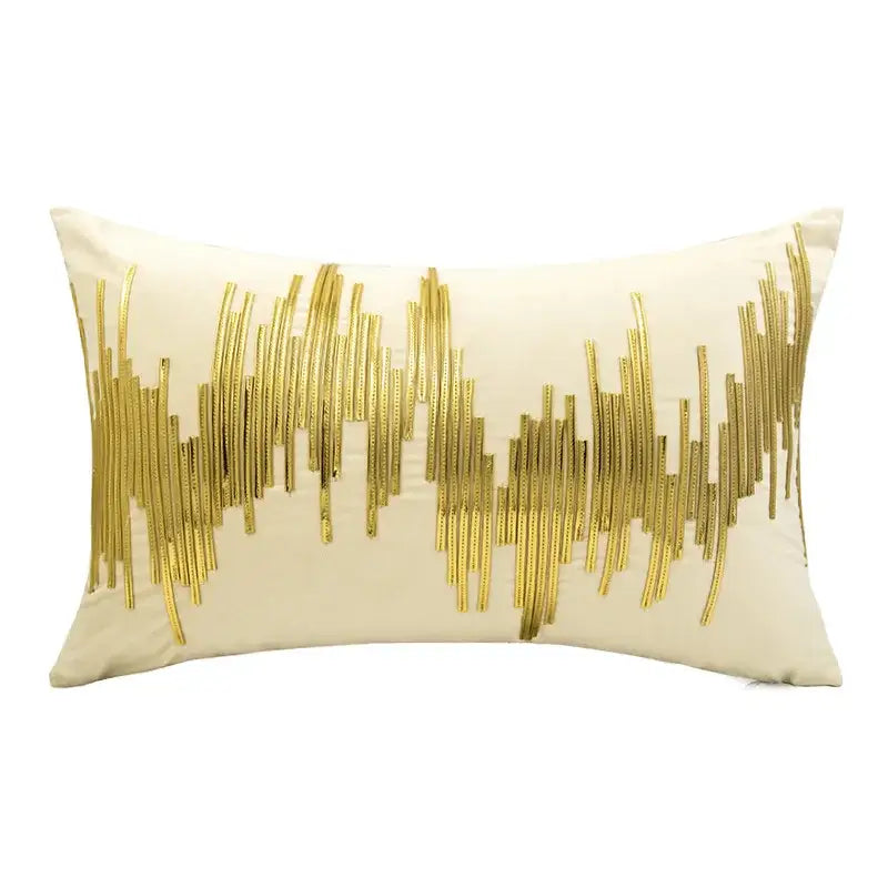 Cream-colored velvet cushion cover with vertical gold luxe metallic stripes from decorbites luxe metallic collection