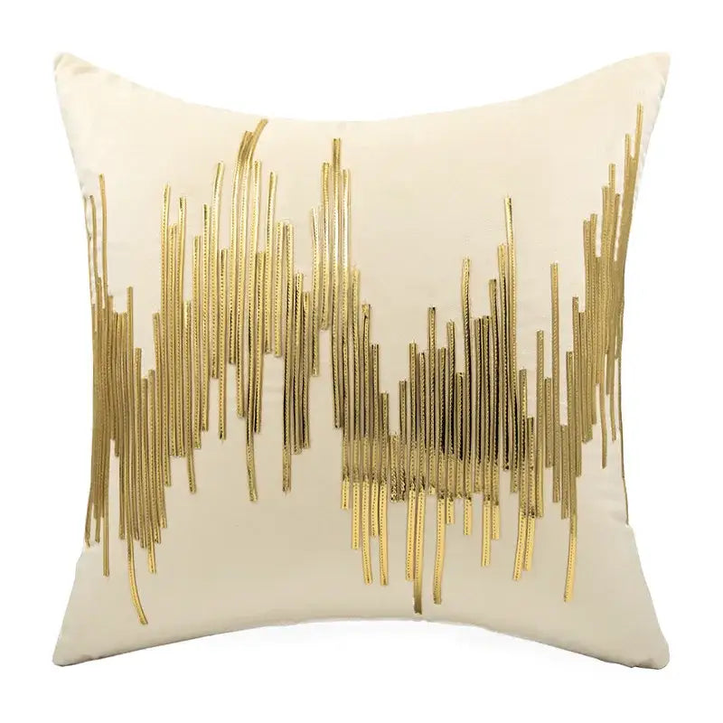 Cream-colored velvet cushion cover with decorbites luxe metallic gold stripes in wave pattern midcentury modern design