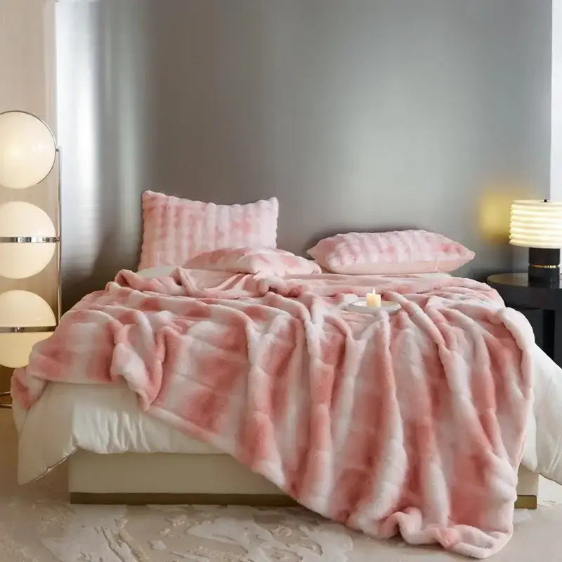 Pink and white gradient faux fur throw blanket with plush texture by decorbites luxe milk velvet for home and office use