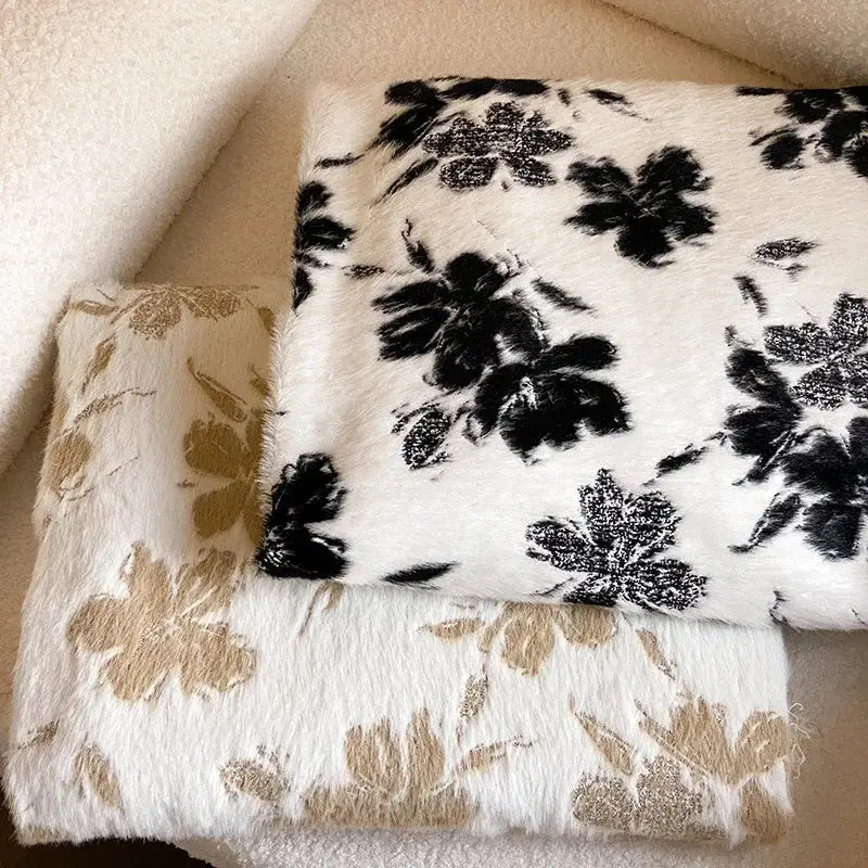 White faux fur decorbites luxe mink fur jacquard throw with black floral pattern for cozy warmth and style