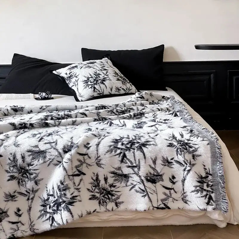 Decorbites luxe mink fur jacquard throw white plush blanket with black bamboo leaf pattern and fringed edges