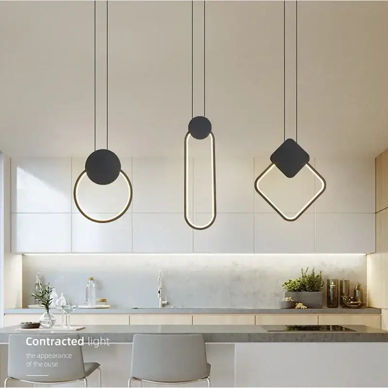 Three modern minimalist black and gold pendant lights with geometric frames for decorbites luxe nordic circle lamp