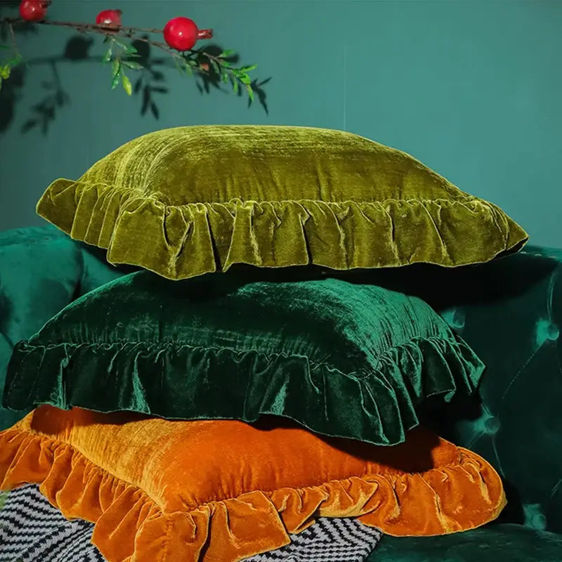 Stacked velvet euro pillow shams in olive green deep emerald and burnt orange with ruffled edges by decorbites