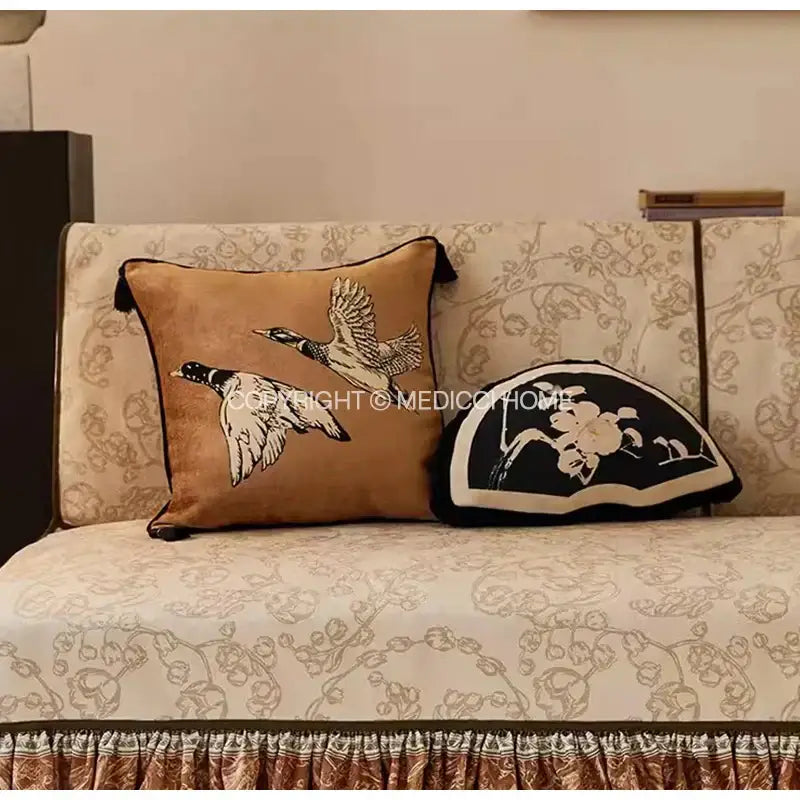 Tan decorative pillow case with embroidered flying ducks and black tassels by decorbites for sofa bed elegance