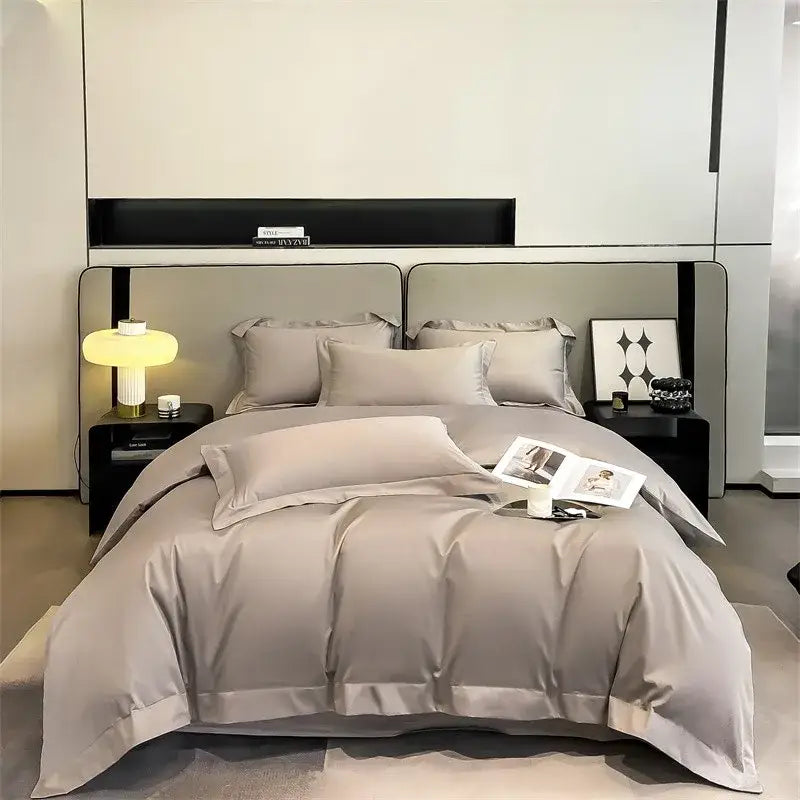 The DecorBites Luxurious 1000TC Egyptian cotton duvet cover set in light gray satin with matching fitted sheet and pillows