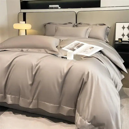 The DecorBites™ luxurious 1000TC Egyptian cotton duvet cover set in gray satin with matching fitted sheet and piping