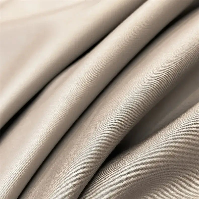 Beige satin fabric with a smooth glossy finish and subtle woven texture for decorbites™ 1000tc egyptian cotton duvet cover and fitted sheet