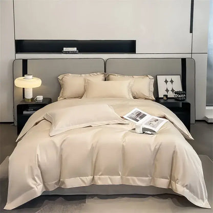 Beige satin duvet set with matching pillows and a smooth, luxurious finish.