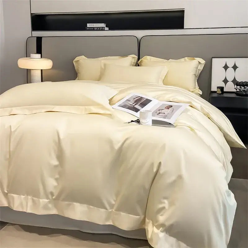 Cream-colored satin duvet cover set with fitted sheet and ruffled edges from decorbites™ luxurious 1000tc egyptian cotton bedding set