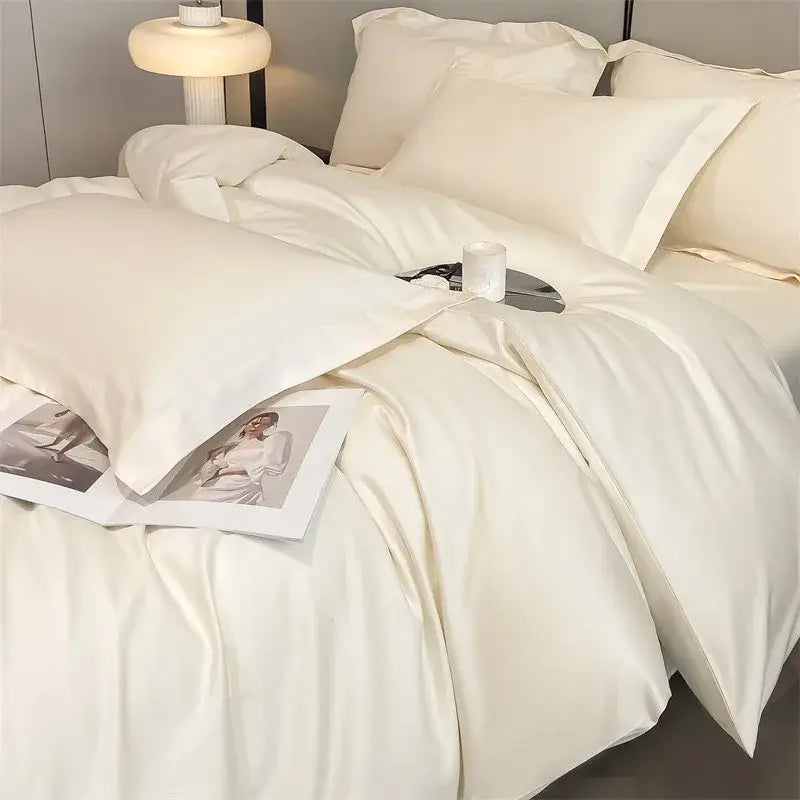 Cream-colored decorbites™ luxurious 1000tc egyptian cotton duvet cover and fitted sheet with smooth satin texture and elegant folds