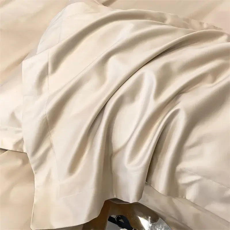 Cream-colored satin pillowcase from decorbites™ luxurious 1000tc egyptian cotton bedding set with glossy finish ideal for duvet cover use