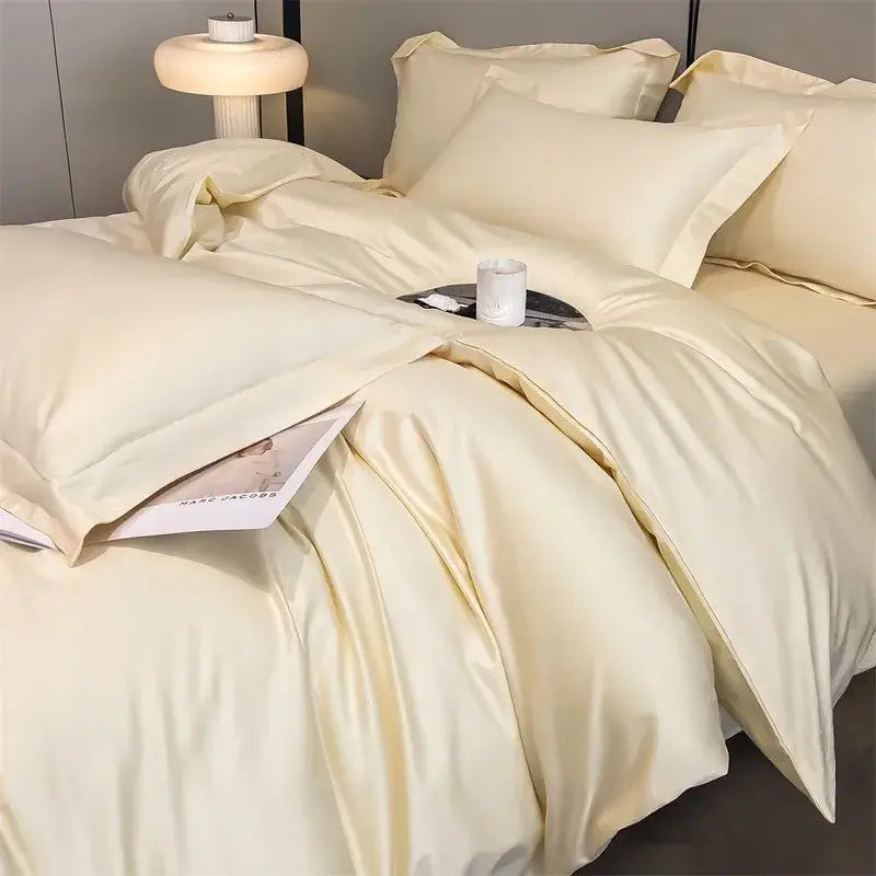 Cream-colored satin duvet cover and fitted sheet from decorbites™ luxurious 1000tc egyptian cotton bedding set