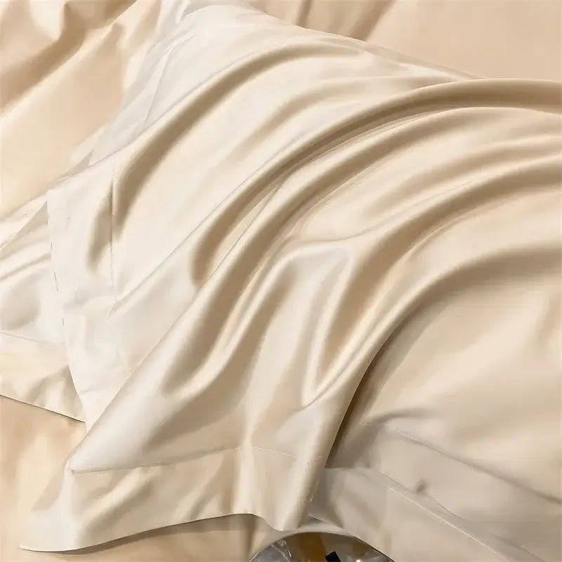 Cream-colored satin pillowcase with smooth glossy texture and elegant folds from decorbites luxurious 1000tc egyptian cotton bedding set including duvet cover and fitted sheet