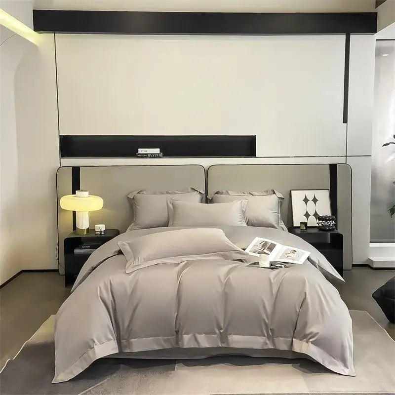 Gray satin duvet cover set with matching pillows on a modern bed part of decorbites luxurious 1000tc egyptian cotton bedding set