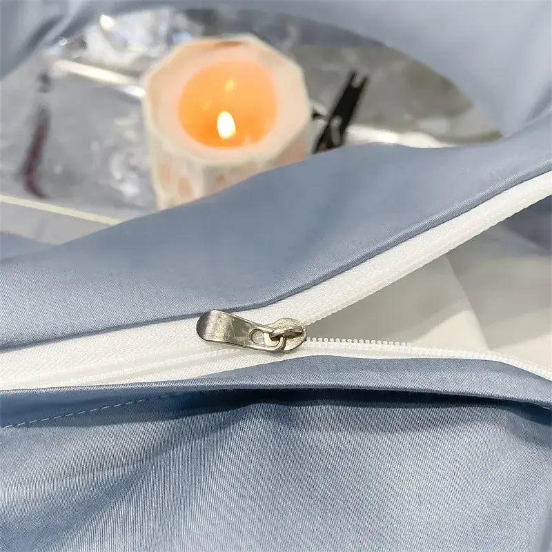 Light blue satin like piece duvet cover with white zipper and metallic pull tab in DecorBites Luxurious 1000TC Egyptian cotton bedding set