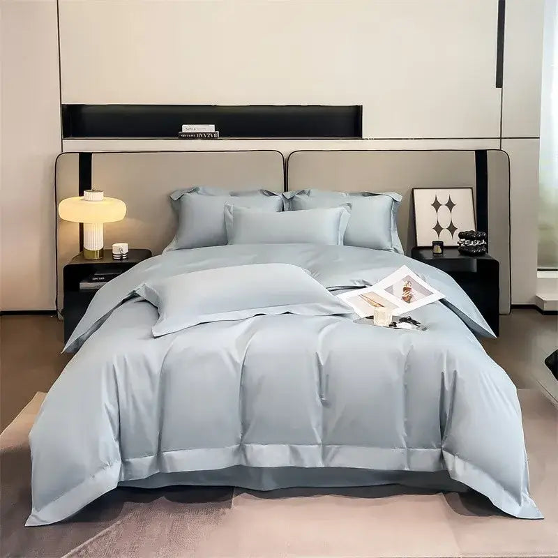 Light blue satin-like DecorBites™ 1000TC Egyptian cotton duvet cover and fitted sheet with subtle sheen and modern design