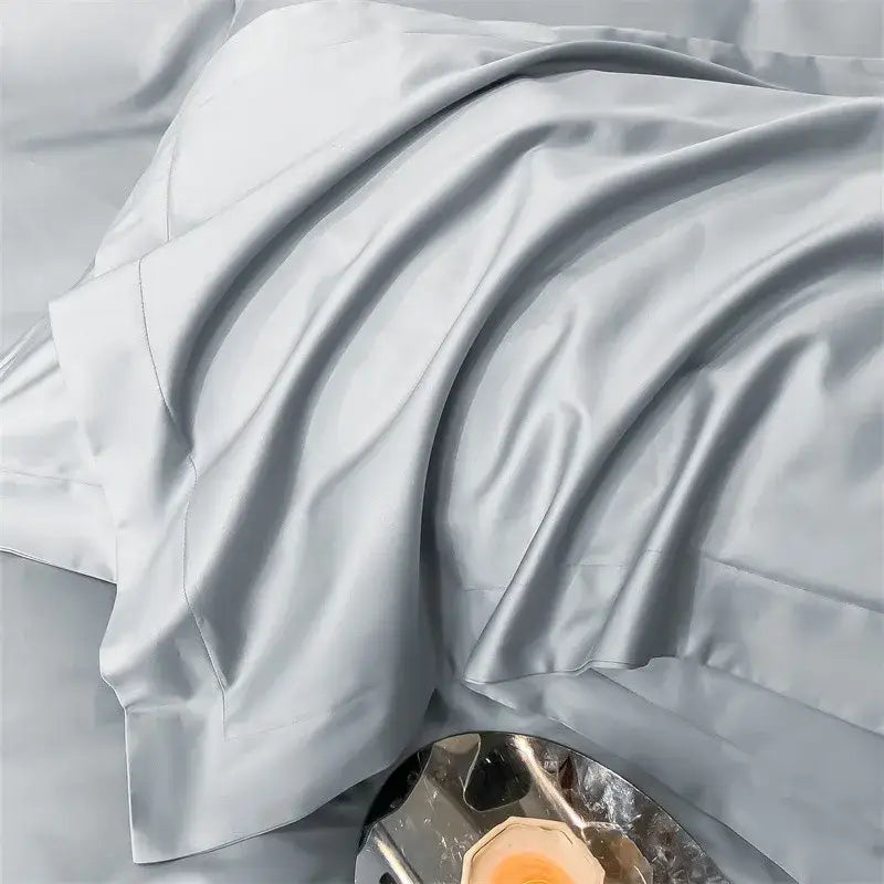 Light gray satin pillowcase with smooth glossy finish and subtle sheen from decorbites™ 1000tc egyptian cotton bedding set including duvet cover and fitted sheet