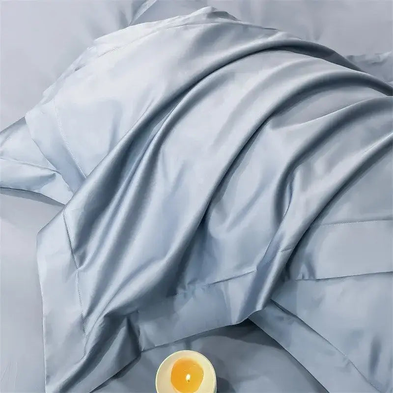 Silk pillowcase with smooth light blue satin finish included in decorbites luxurious 1000tc egyptian cotton duvet cover set