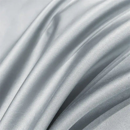 Silky silver duvet cover with smooth reflective surface and subtle vertical ribbing from decorbites™ luxurious 1000tc egyptian cotton bedding set