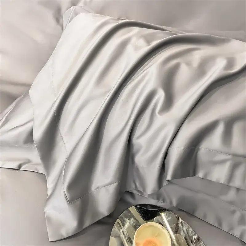 DecorBites™ luxurious silver-gray satin pillowcase with smooth glossy finish complements 1000TC Egyptian cotton duvet cover