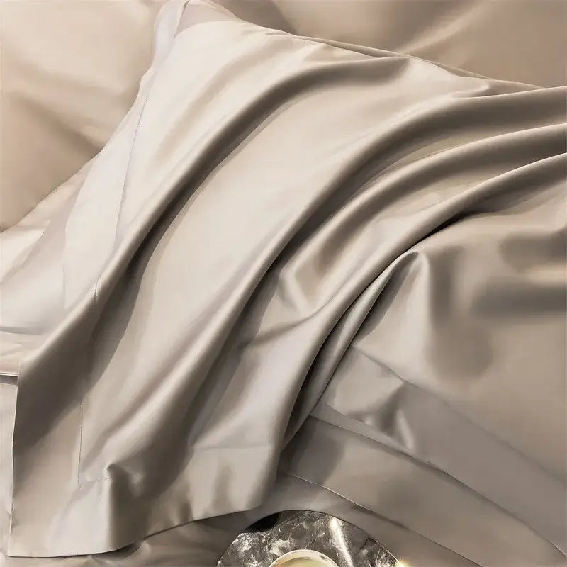 A luxurious silver-gray satin pillowcase with a smooth glossy finish from decorbites 1000tc egyptian cotton duvet cover set