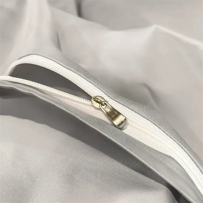 Silver-toned zipper with metallic pull tab on white luxurious 1000tc egyptian cotton duvet cover by decorbites