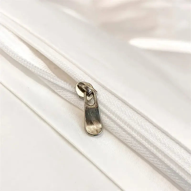 Silver-toned zipper pull on white egyptian cotton duvet cover from decorbites luxurious 1000tc bedding set