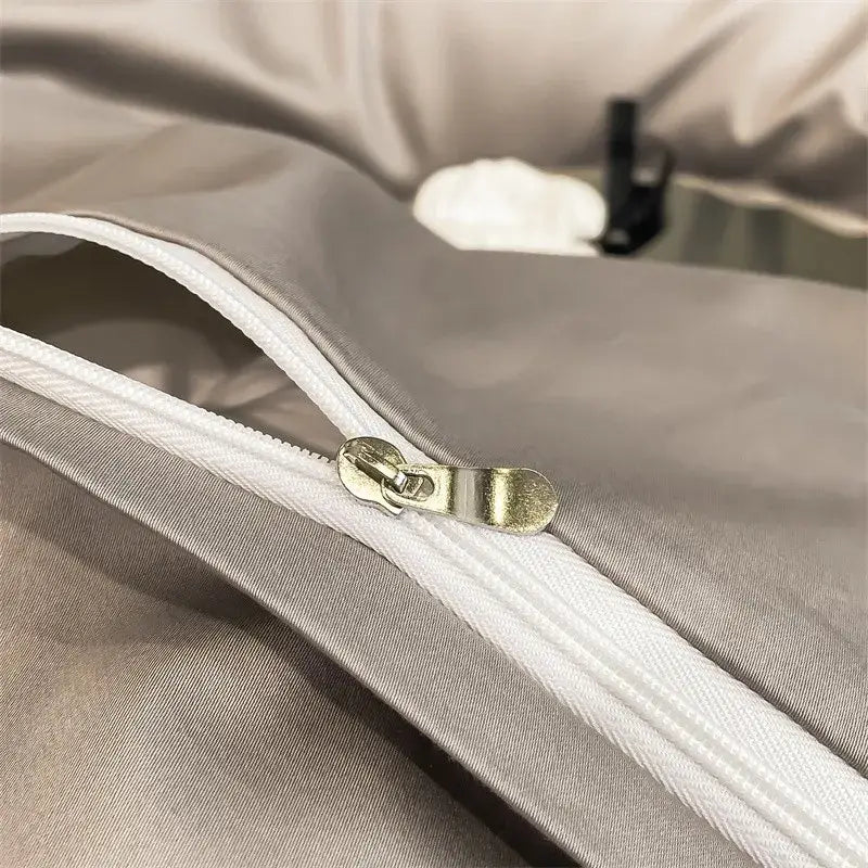 Silver-toned zipper with metallic pull tab on gray fabric of decorbites™ luxurious 1000tc egyptian cotton duvet cover