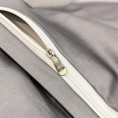 Silver-toned zipper with metallic pull tab on soft gray 1000tc egyptian cotton duvet cover by decorbites luxuriously designed