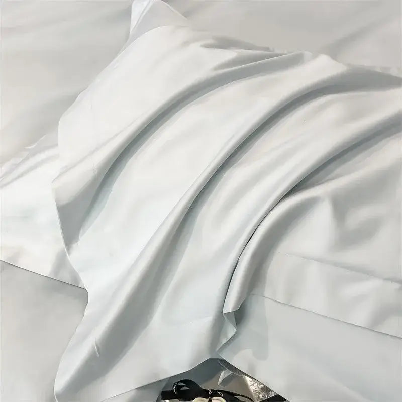 A smooth white satin pillowcase from decorbites™ luxurious 1000tc egyptian cotton bedding set with subtle sheen