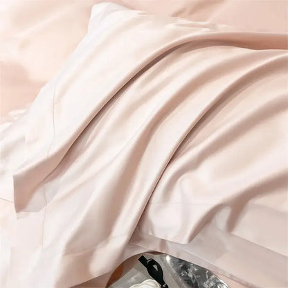 A soft blush-pink satin pillowcase with a smooth finish from decorbites™ luxurious 1000tc egyptian cotton bedding set, ideal for duvet cover and fitted sheet use
