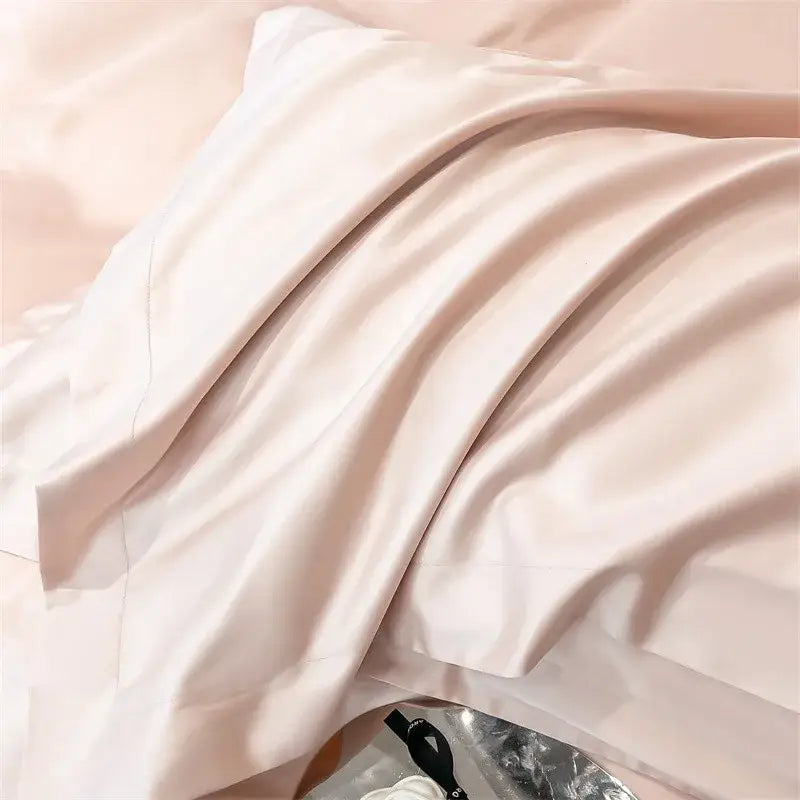 A soft blush-pink satin pillowcase with a smooth finish from decorbites™ luxurious 1000tc egyptian cotton bedding set, ideal for duvet cover and fitted sheet use