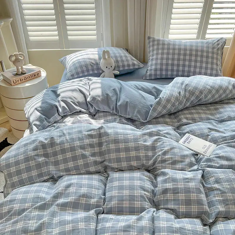 Blue and white plaid quilted duvet cover bedding set from DecorBites™ Luxurious 2024 Grid Lattice collection with flat sheet