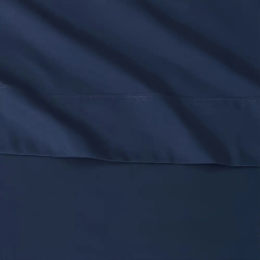Dark navy blue satin pillowcase from decorbites™ luxurious cooling sheet set with subtle sheen and precise stitching
