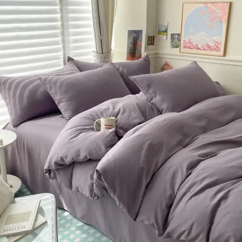 A plush lavender decorbites™ luxurious cotton bedding set with a soft satin-like finish for single and couple beds